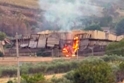 Tribuna crollata e in fiamme